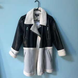 Edgy Sherpa lined faux leather jacket